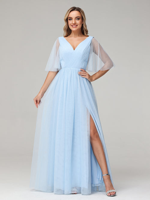 Bridesmaids in Knee Length Powder Blue Dresses at Summer Wedding